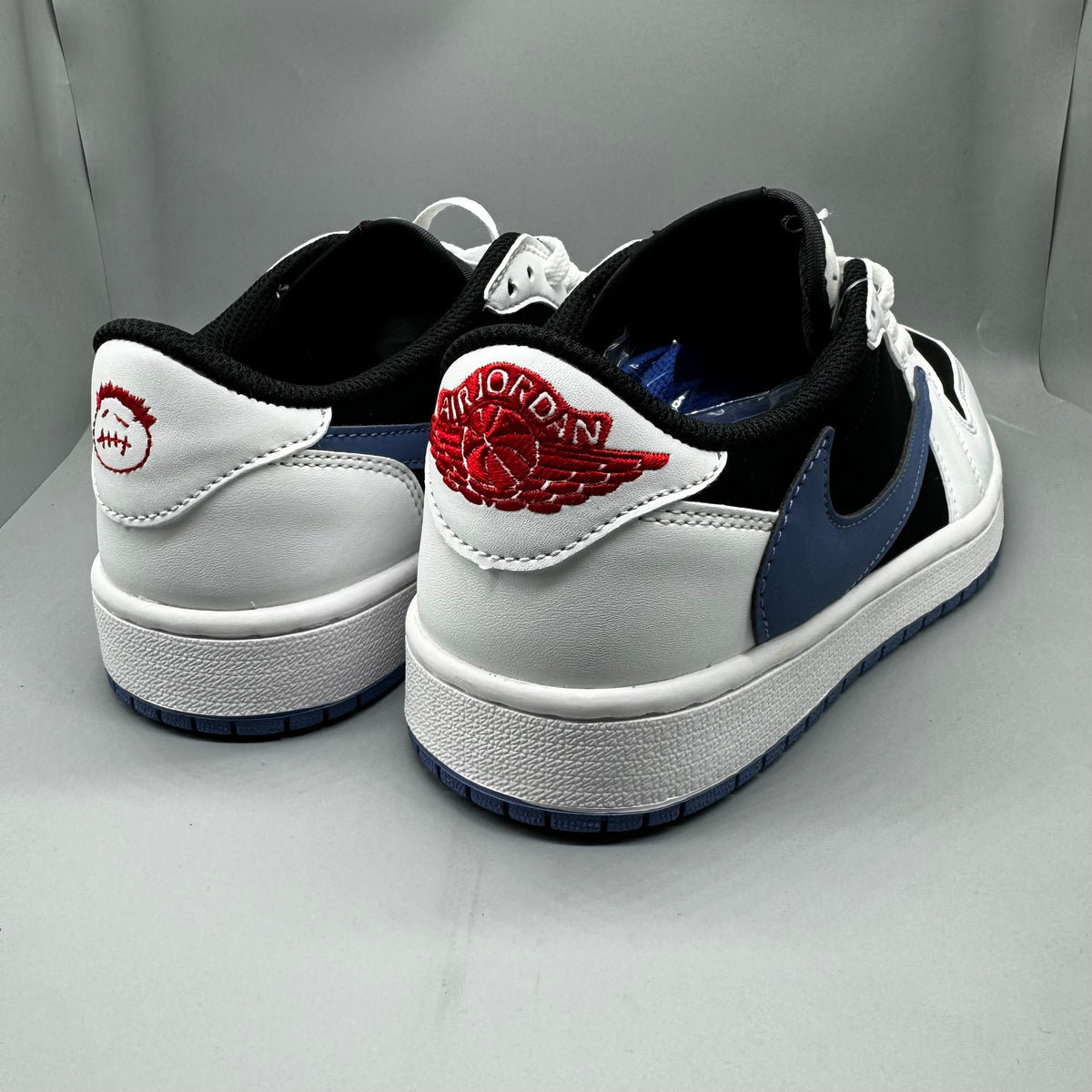 Air Jordan 1 Low 'Black / University Blue / White'