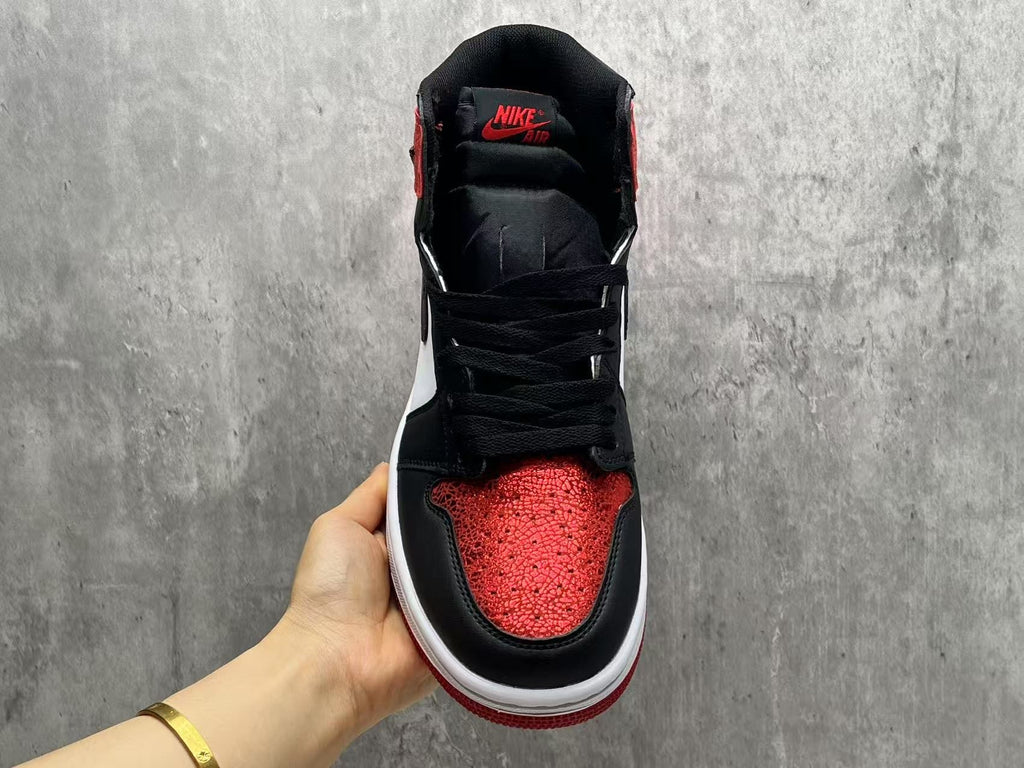 Air Jordan 1 High OG – White / Varsity Red / Black 'Bred Toe'